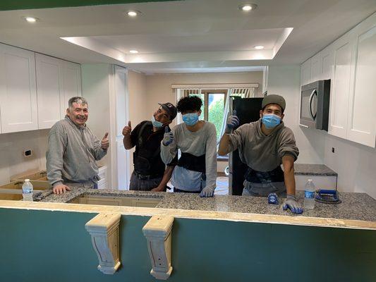 Whew!  Still smiling after lifting and moving around that granite.  It is quite heavy!