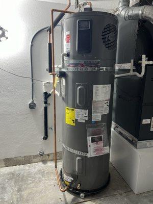 Petko and his son installed the heat pump water heater, along with new drain line.