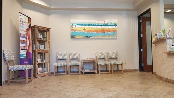 Peaceful waiting room with music and water provide a nice touch!