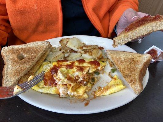 Western omelette (ketchup added),  home fries, wheat toast.