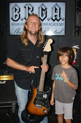 Brian with one of his youngest student after his performance.