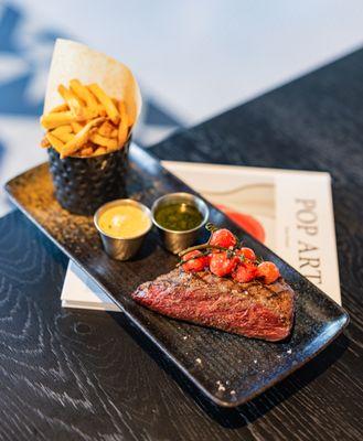 Steak frites and house cut fries with a side of garlic aioli