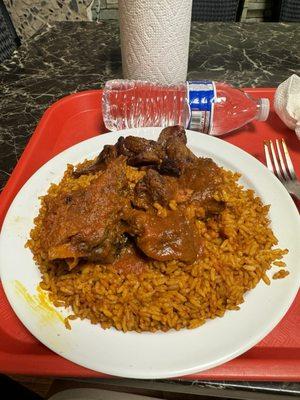 Fish and beef stew with jollof rice and plantain