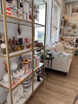 Directly inside the front door, cute vases.