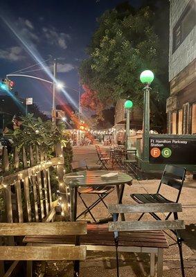 Outdoor seating on a quiet street