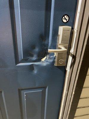 Door beat to shit