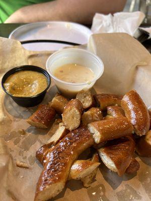 Pretzels with queso and spicy brown mustard