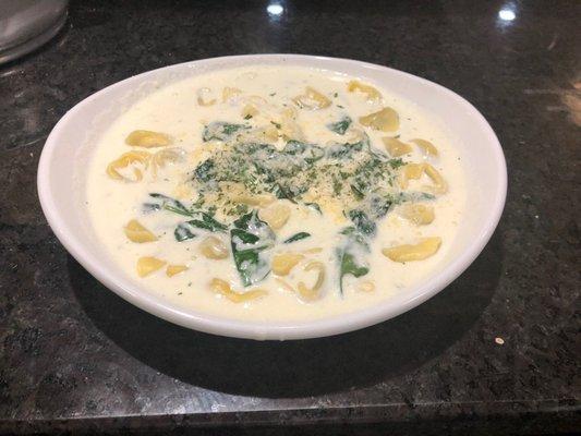 Tortellini Florentine: Sautéed Shrimp in Alfredo Sauce with Meat Tortellini