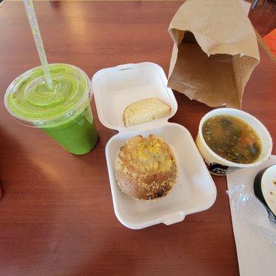 Super Green smoothie, blueberry muffin, chicken and quinoa soup, slice of white bread.