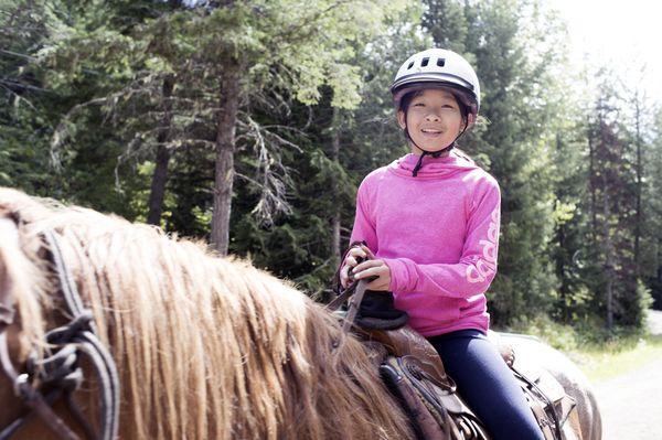 Family reunion photography shot on a trail ride in Whistler, Ontario.