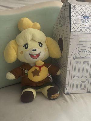 My Isabelle teddy bear from "the animal crossing," that was made by Built-A-Bear Workshop.