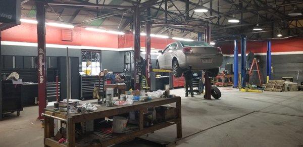 Finally getting our shop looking new with a fresh coat of paint and new cabinets. Sorry for the messy bench in the front.