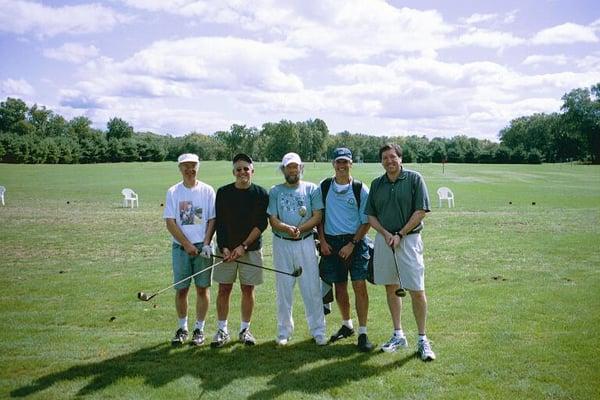 When not at work, i love to play golf...I am 2nd from left waiting to tee off... (I probably shot a double bogey on that hole!!)