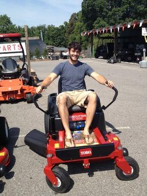 Jon playing with a mower