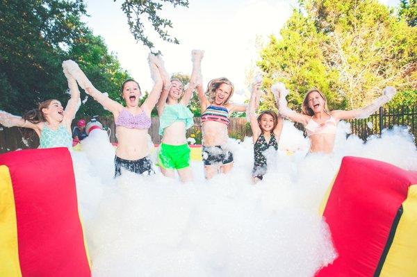 Epic girls foam birthday party in the backyard! It's so easy and fun to do!