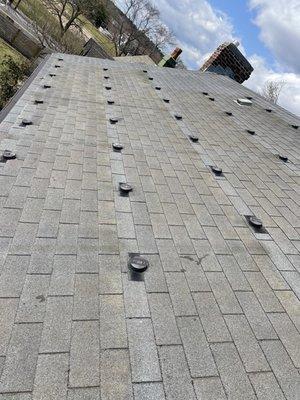 This is how Sunrun left the roof. The solar panel brackets punctured the roof underlayment. Had to get a new roof, Sunrun refuses to pay.