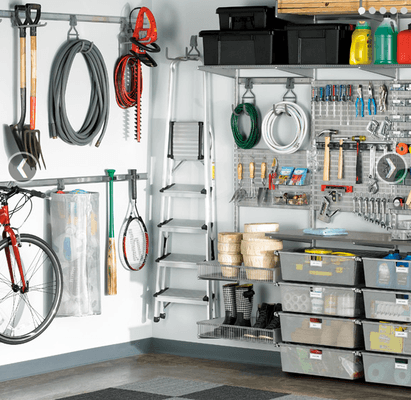 An organized garage using the elfa system from The Container Store - everything has a place!