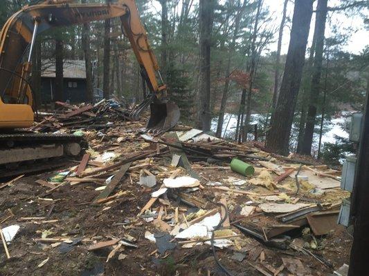 Demolition of an older mobile home.