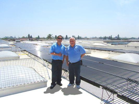 Steve & Luke Harrison at their first Solyndra solar installation.