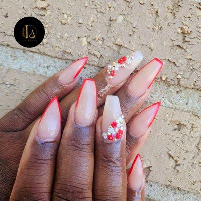 If you are a fan of nail art but still like to stay trendy and simple, try placing designs on your nails for a chic and minimalist look.