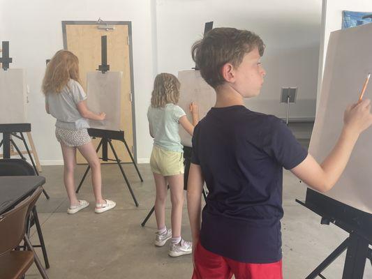 Children in a drawing class at Cultivate in Grand Rapids