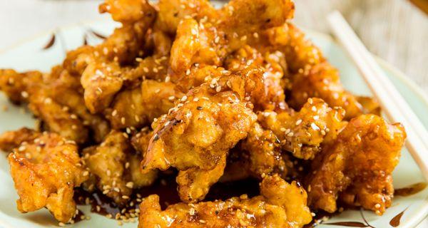 Crispy Honey Sesame Chicken - Our top seller. Crispy tender chicken tossed in some caramelized honey soy with a mild kick. (芝麻鸡)