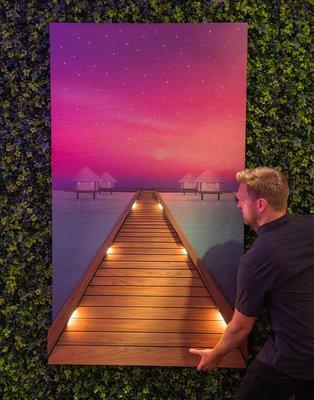 3d wood wall sculpture with a perspective view of walking out to the water bungalows in Bora Bora.