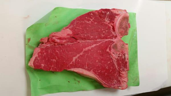 Thick and Juicy USDA beef Porterhouse Steak cut daily.