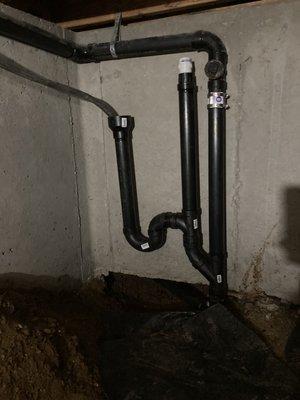 An addition of a condensate drain for tankless water heater and humidifier drain from the furnace in a crawl space.