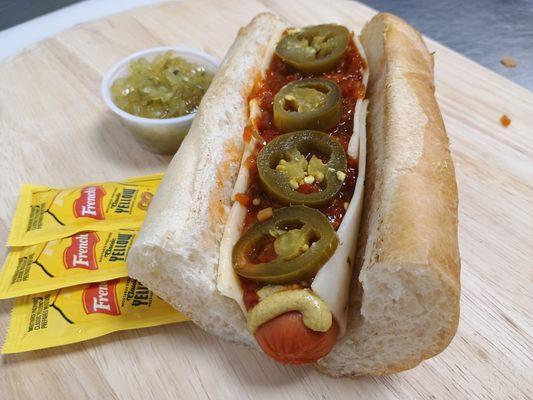 Hunk-A-Burnin' Love Dog with hot pepper relish, jalapenos, pepper jack cheese, and brown spicy mustard.