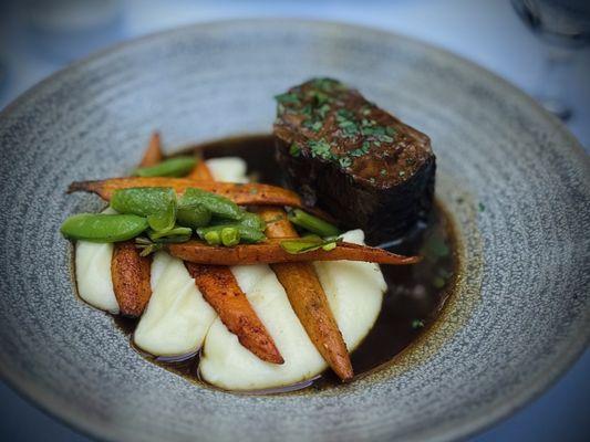 Red Wine Braised Short Rib w/Yukon Gold Mashed Potatoes, Charred Baby Carrots & Sweet Peas