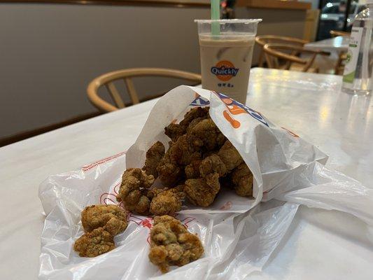 Taiwan chicken nuggets (spicy) and coconut milk tea with boba.