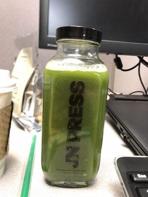 On my desk at work. Go Green Lo White! So good. Packed with a ton of different greens, lemon, apple, and other stuff!