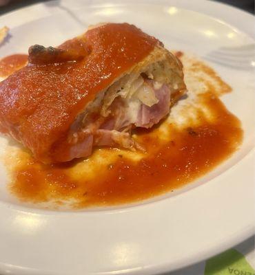 One piece of the deli Stromboli