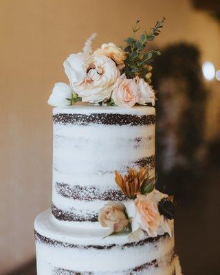 semi naked wedding cake, chocolate with hazelnut buttercream. Delicious!