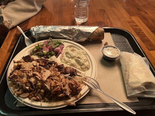 Shawarma pita wrap and Platter number 1 with babaganosh and tahini sauce.