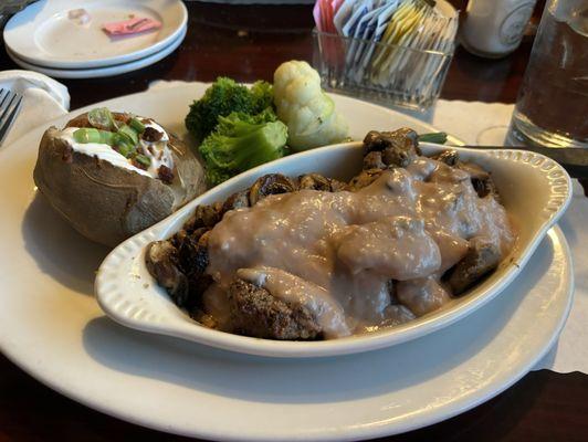 Beef tips Comes with salad baked potato and veggies! Can't go wrong here. Lots of food and service is amazing!!!