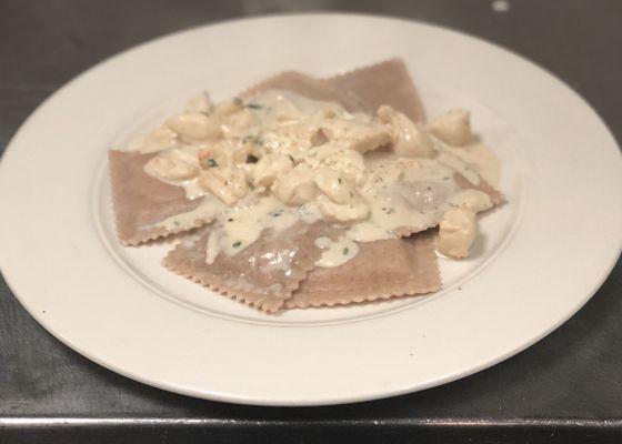 Butternut Squash Ravioli with Jumbo Lump Crabmeat and Pink Champagne Sauce !