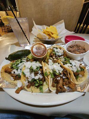 Pastor Tacos. I almost gave up eating all of this. It a huge plate.