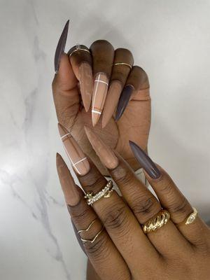 Extra Long Stiletto Nails.