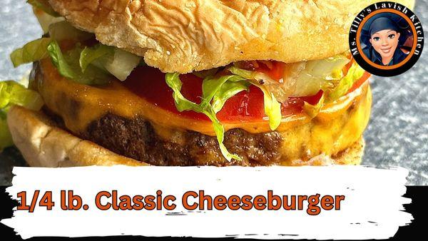 This classic burger is  a juicy hamburger patty, melted America cheese, lettuce, tomatoes, and red onions, all on a toasted bun.