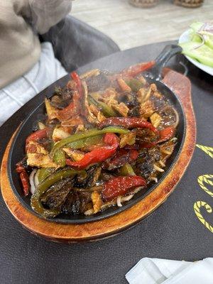 Steaming Carne Fajitas with vegetables