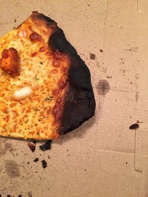 Burnt crust. Terrible pizza