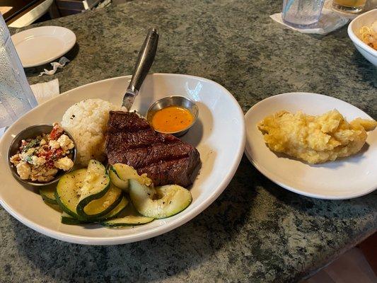 Filet mingnon, everything on the side for my kiddo. Topping, sauce, zucchini, rice, potatoes