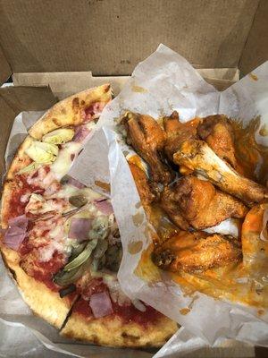 Pizza and wings were so filling I had to take half to go.