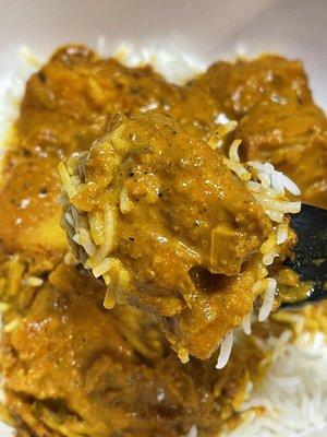 6. Chicken Vindaloo over rice - boneless chicken with potatoes in a spicy sauce (takeout)