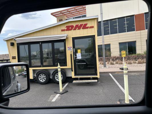 No, don't go to the huge building that says DHL go to this tiny trailer at the corner if you want to mail the package