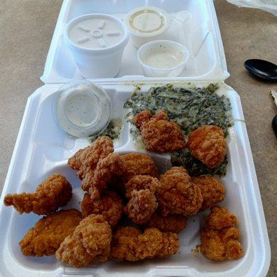 $5 worth of popcorn chicken and creamed spinach. When you need to eat cheap.