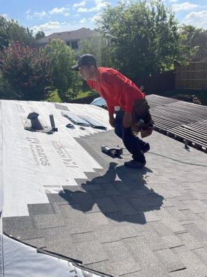 Installing new shingles on roof