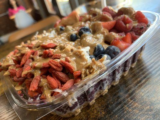 East market açaí bowl with almond butter added on (sub raspberry since bananas not available)